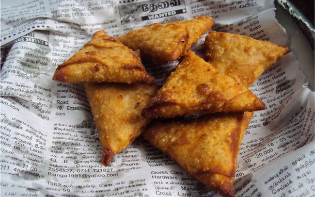 Bọc thực phẩm bằng giấy báo thực sự rất nguy hiểm, ảnh hưởng tới sức khỏe.